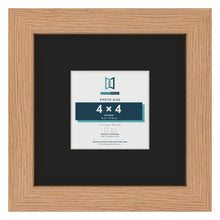 Oak 8 x 8 inch picture frame with a black mount for a 4 x 4 inch photo