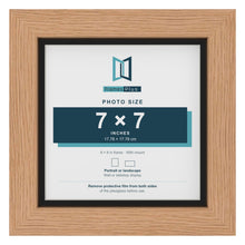 Oak 8 x 8 inch picture frame with a black mount for a 7 x 7 inch photo