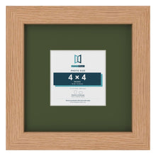 Oak 8 x 8 inch picture frame with a green mount for a 4 x 4 inch photo