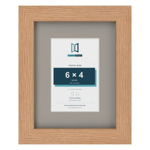 Oak 9 x 7 inch picture frame with a Dawn Grey mount for a 6 x 4 inch photo