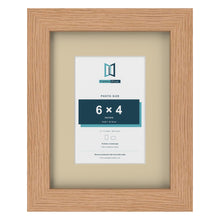 Oak 9 x 7 inch picture frame with an ivory mount for a 6 x 4 inch photo