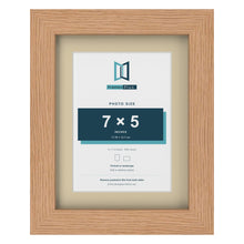 Oak 9 x 7 inch picture frame with an ivory mount for a 7 x 5 inch photo