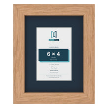 Oak 9 x 7 inch picture frame with a Pacific Blue mount for a 6 x 4 inch photo