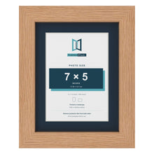 Oak 9 x 7 inch picture frame with a Pacific Blue mount for a 7 x 5 inch photo