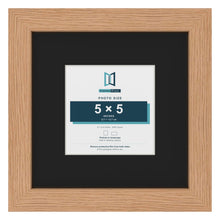 Oak 9 x 9 inch picture frame with a black mount for a 5 x 5 inch photo