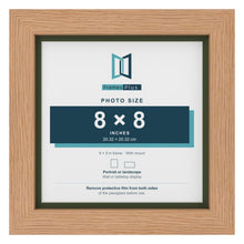 Oak 9 x 9 inch picture frame with a green mount for an 8 x 8 inch photo