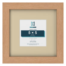 Oak 9 x 9 inch picture frame with an ivory mount for a 5 x 5 inch photo