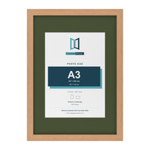 Oak A2 picture frame with a green mount for an A3 photo