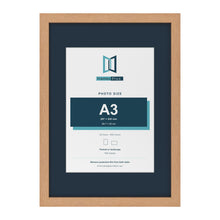 Oak A2 picture frame with a Pacific Blue mount for an A3 photo