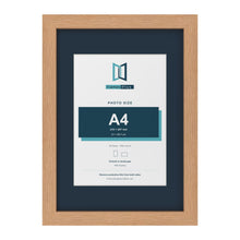 Oak A3 picture frame with a Pacific Blue mount for an A4 photo