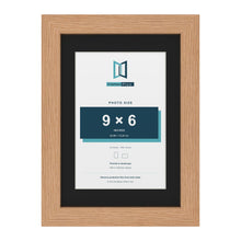 Oak A4 picture frame with a black mount for a 9 x 6 inch photo