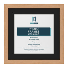 Oak picture frame with a black mount