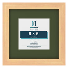Pine 10 x 10 inch picture frame with a green mount for a 6 x 6 inch photo
