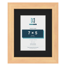 Pine 10 x 8 inch picture frame with a black mount for a 7 x 5 inch photo