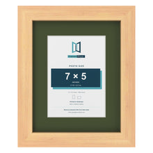 Pine 10 x 8 inch picture frame with a green mount for a 7 x 5 inch photo
