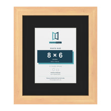 Pine 12 x 10 inch picture frame with a black mount for an 8 x 6 inch photo