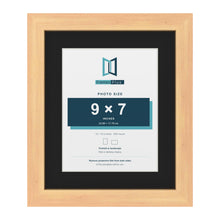 Pine 12 x 10 inch picture frame with a black mount for a 9 x 7 inch photo