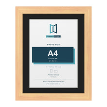 Pine 14 x 11 inch picture frame with a black mount for an A4 photo