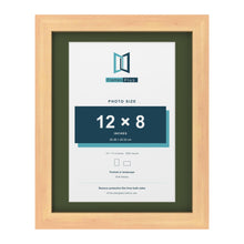 Pine 14 x 11 inch picture frame with a green mount for a 12 x 8 inch photo