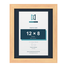 Pine 14 x 11 inch picture frame with a Pacific Blue mount for a 12 x 8 inch photo