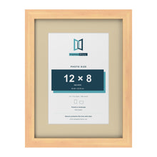 Pine 16 x 12 inch picture frame with an ivory mount for a 12 x 8 inch photo