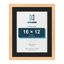 Pine 20 x 16 inch picture frame with a black mount for a 16 x 12 inch photo