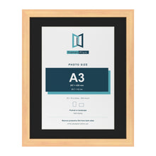 Pine 20 x 16 inch picture frame with a black mount for an A3 photo