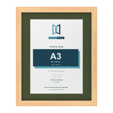 Pine 20 x 16 inch picture frame with a green mount for an A3 photo