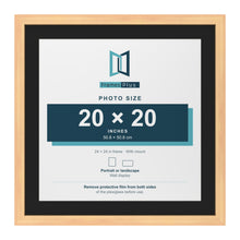 Pine 24 x 24 inch picture frame with a black mount for a 20 x 20 inch photo