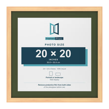 Pine 24 x 24 inch picture frame with a green mount for a 20 x 20 inch photo