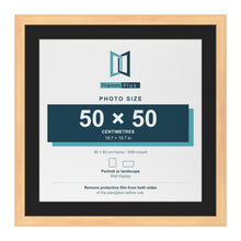 Pine 60 x 60 cm picture frame with a black mount for a 50 x 50 cm photo