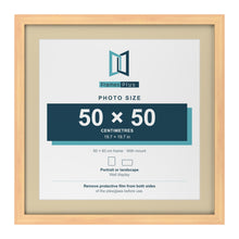 Pine 60 x 60 cm picture frame with an ivory mount for a 50 x 50 cm photo