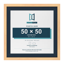 Pine 60 x 60 cm picture frame with a Pacific Blue mount for a 50 x 50 cm photo