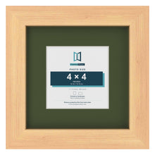 Pine 7 x 7 inch picture frame with a green mount for a 4 x 4 inch photo