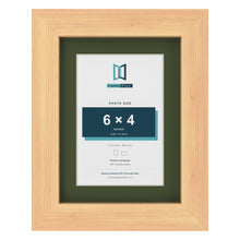 Pine 8 x 6 inch picture frame with a green mount for a 6 x 4 inch photo