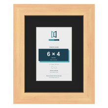 Pine 9 x 7 inch picture frame with a black mount for a 6 x 4 inch photo