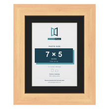 Pine 9 x 7 inch picture frame with a black mount for a 7 x 5 inch photo