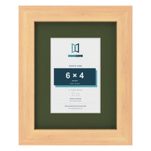Pine 9 x 7 inch picture frame with a green mount for a 6 x 4 inch photo