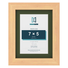 Pine 9 x 7 inch picture frame with a green mount for a 7 x 5 inch photo