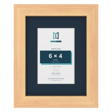 Pine 9 x 7 inch picture frame with a Pacific Blue mount for a 6 x 4 inch photo