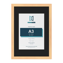 Pine A2 picture frame with a black mount for an A3 photo