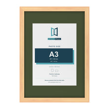 Pine A2 picture frame with a green mount for an A3 photo