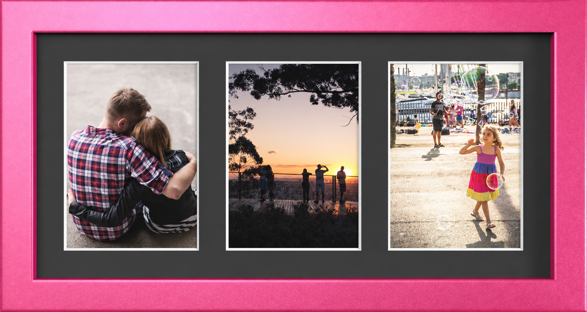 Pink multi-aperture frame, 3 Photos 7x5" with Black Mount displaying photographs
