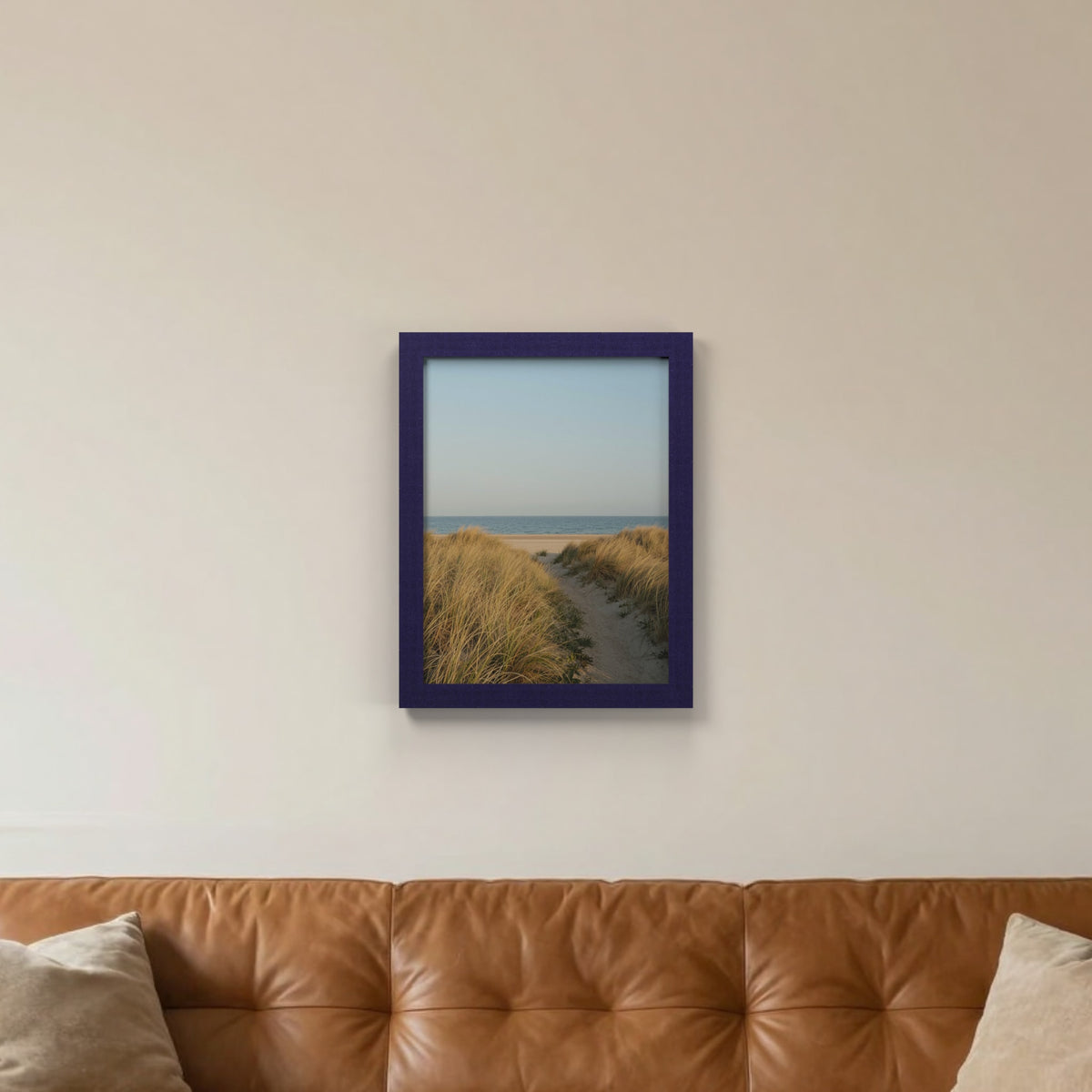 Purple picture frame hanging on a living room wall