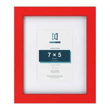 Red 11 x 9 inch picture frame with a white mount for a 7 x 5 inch photo