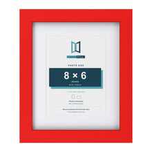 Red 11 x 9 inch picture frame with a white mount for an 8 x 6 inch photo
