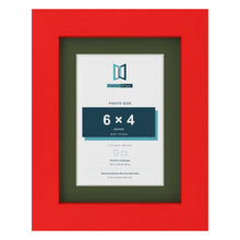 Red 8 x 6 inch picture frame with a green mount for a 6 x 4 inch photo