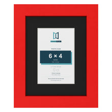 Red 9 x 7 inch picture frame with a black mount for a 6 x 4 inch photo