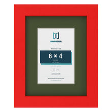 Red 9 x 7 inch picture frame with a green mount for a 6 x 4 inch photo