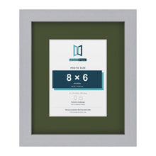 Silver 12 x 10 inch picture frame with a green mount for an 8 x 6 inch photo